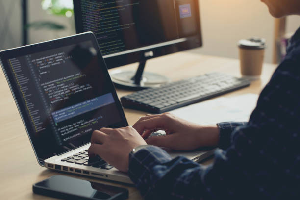 Web developer working on a responsive website layout